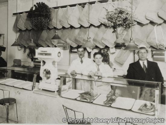 The Smaldone butcher shop, Vincenzo "Jimmy" Smaldone, center.