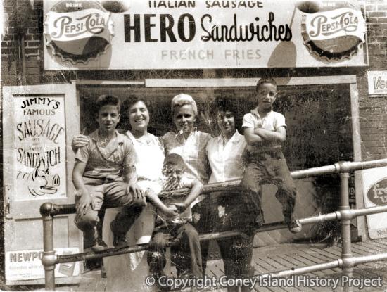 The Smaldone family in front of their restaurant on Stillwell Avenue.