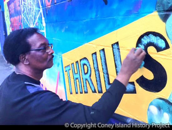 Sam Moses lettering a mural at Deno's Wonder Wheel Park, July 2017. Photo © Charles Denson