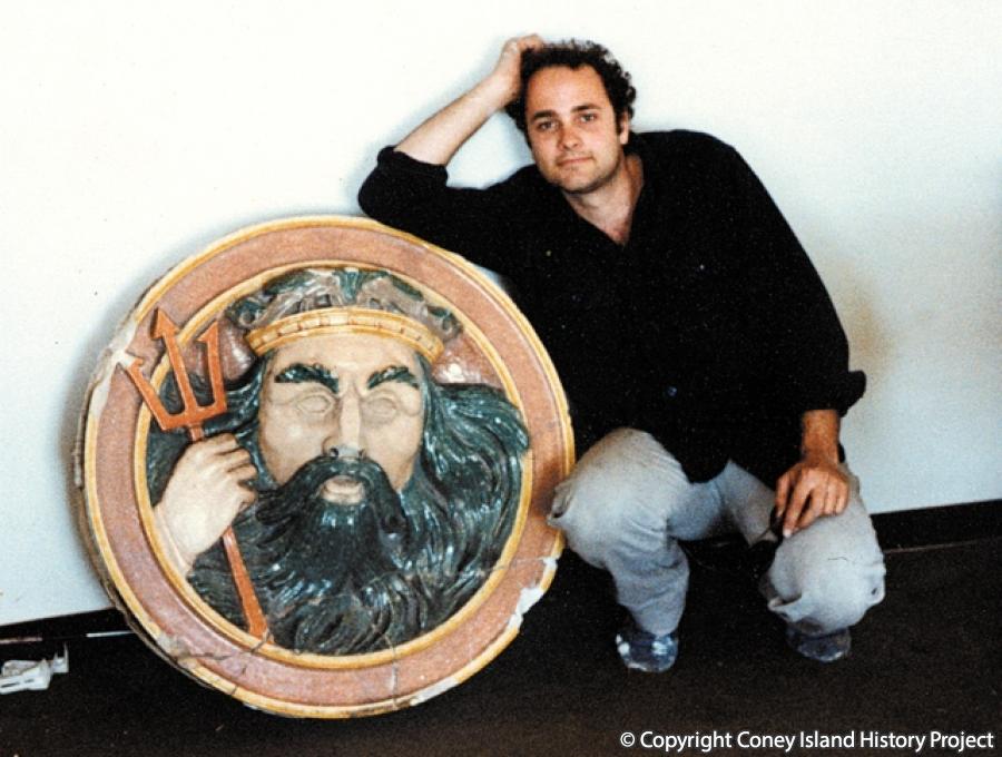 Charles Denson with the Neptune medallion from Washington Baths Annex on the day he donated it to the Brooklyn Museum in 1981. Coney Island History Project Collection.