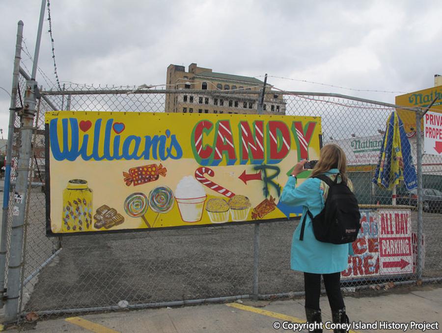 Williams Candy Sign by Hector George Wallace, tagged with graffiti in this October 2014 photo. Photo © Tricia Vita.